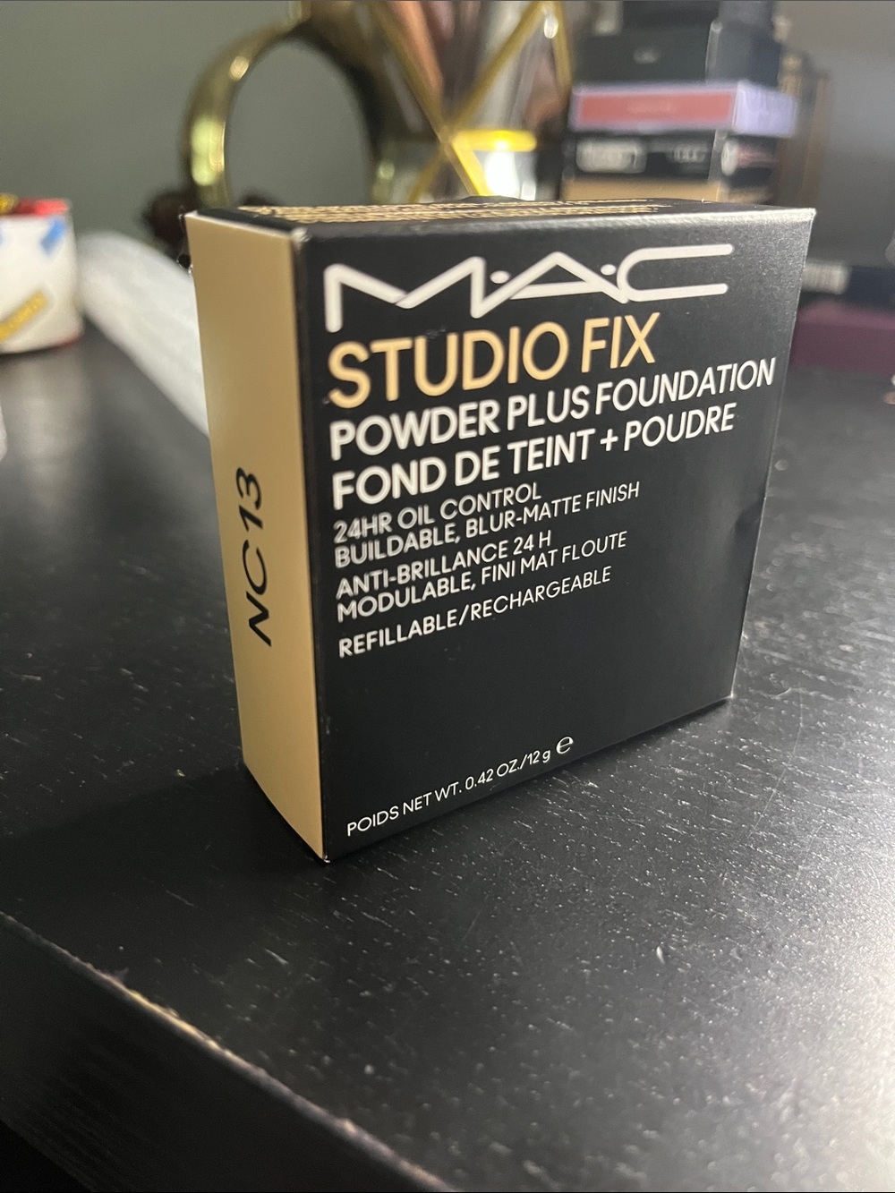 MAC Studio Fix Powder Plus Foundation in the shade NC13.